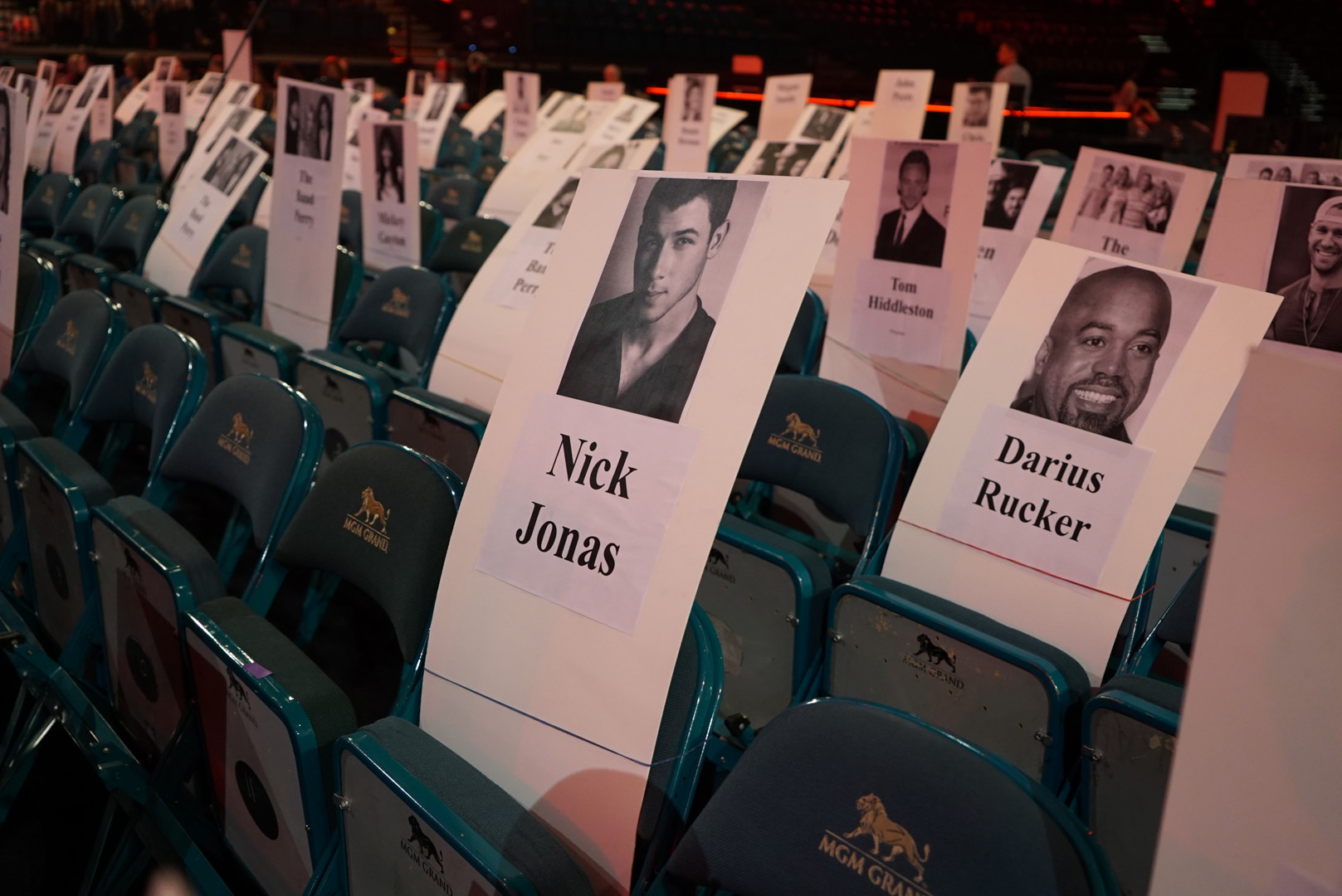 Nick Jonas and Darius Rucker will sit close together at the 51st Academy of Country Music Awards.