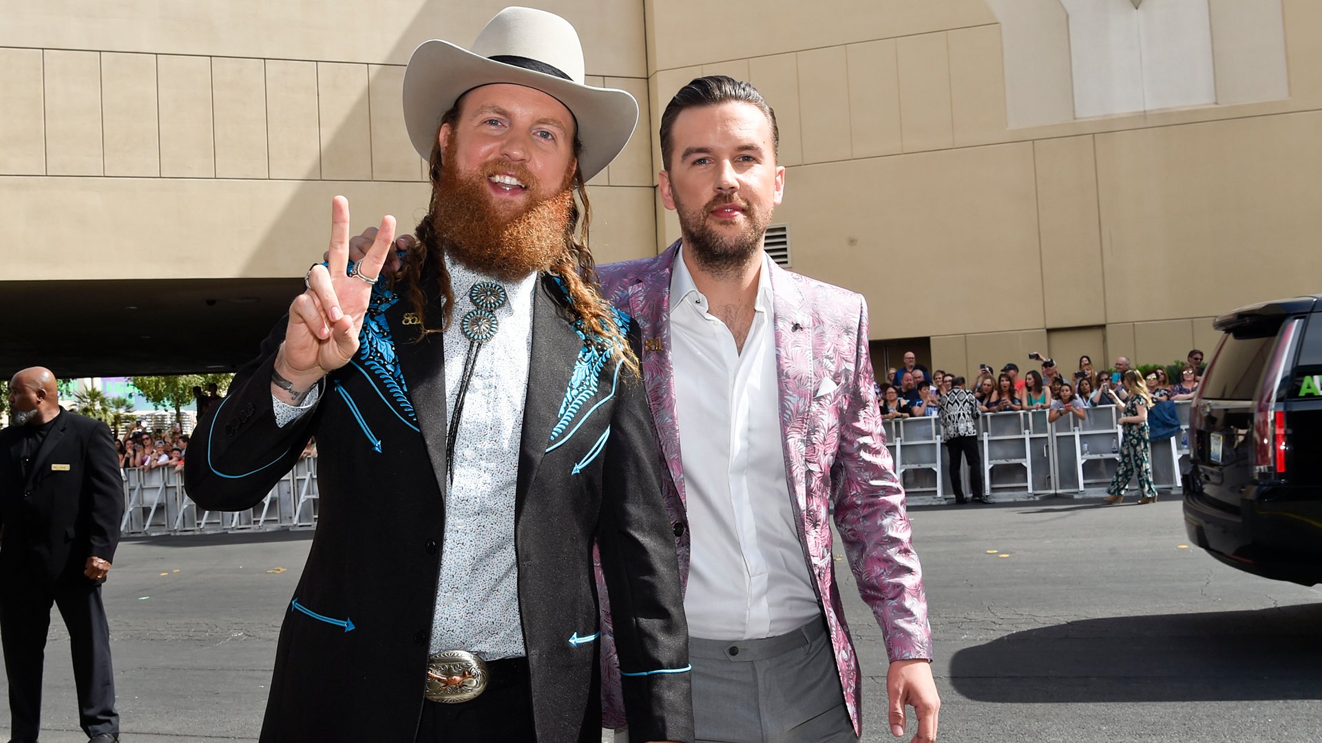 Brothers Osborne bring nothing but peace, love, and bolo ties to the ACM red carpet.