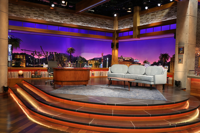 A 3-D Los Angeles skyline sits behind Corden's stage. 