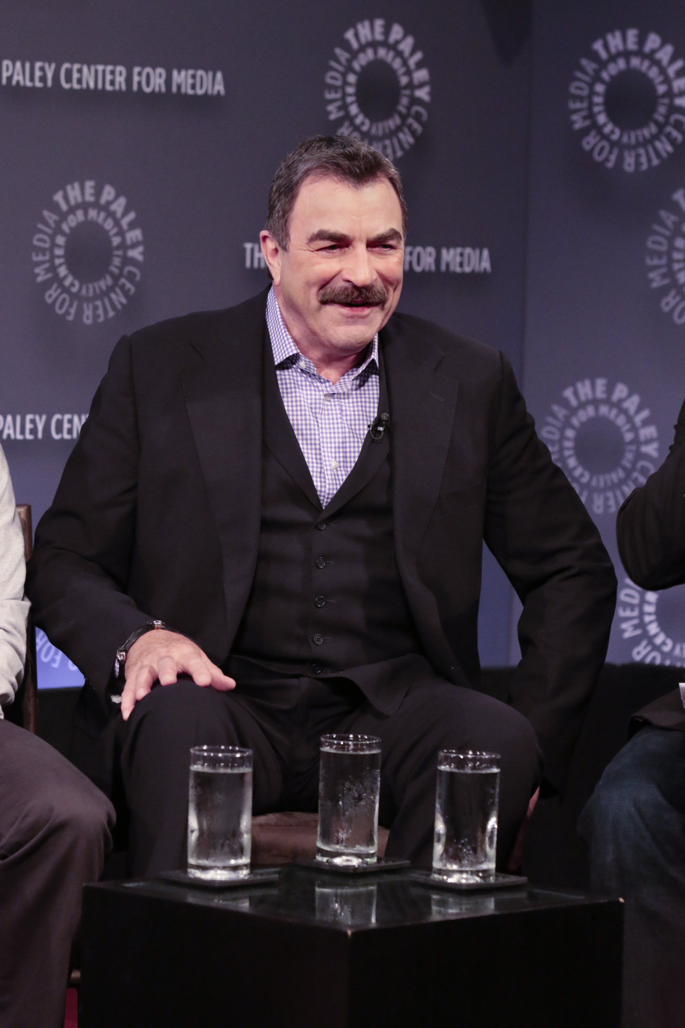 11. Tom Selleck might be drinking three waters.