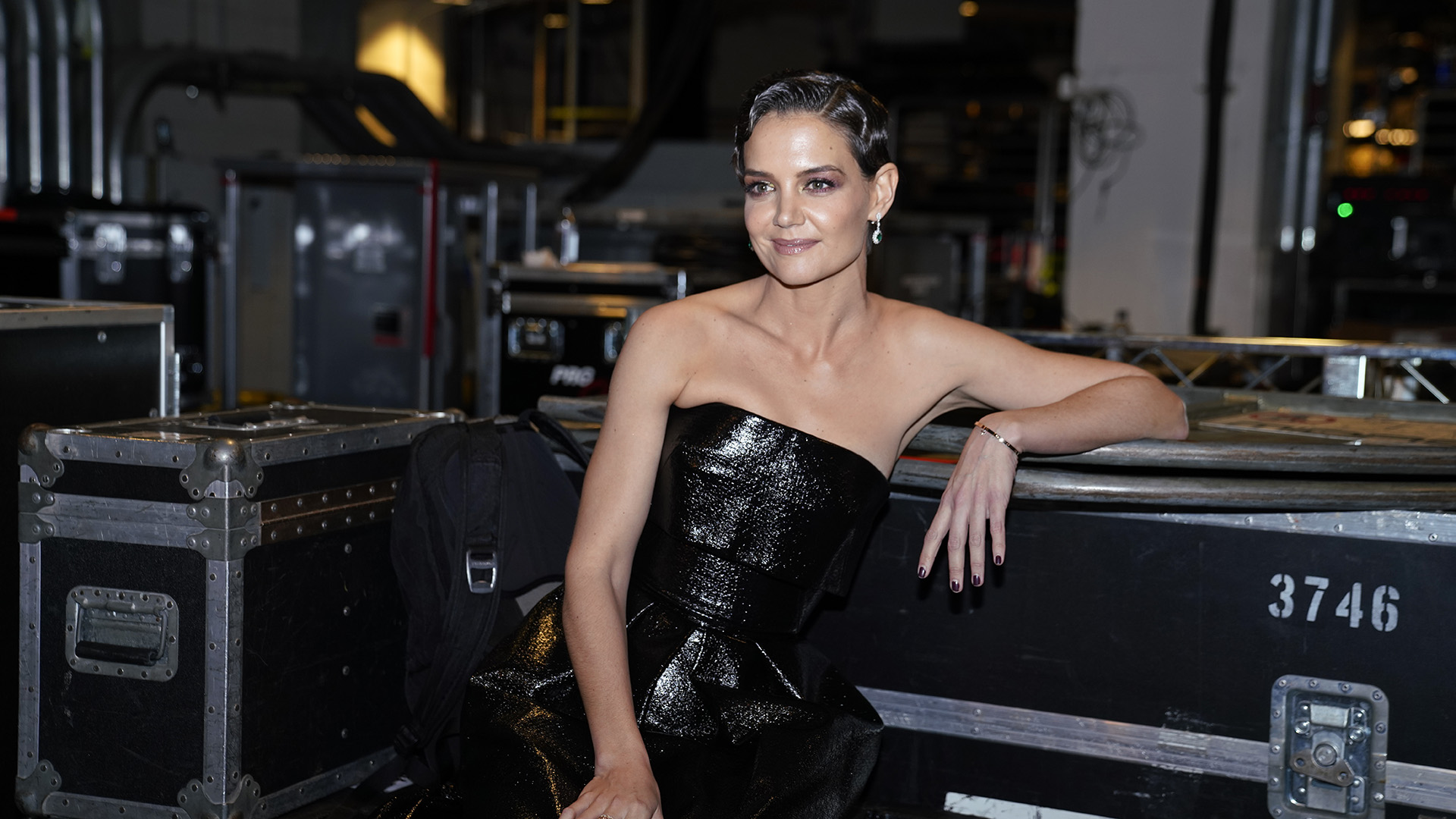 Actress and GRAMMY presenter Katie Holmes takes a minute to relax backstage.
