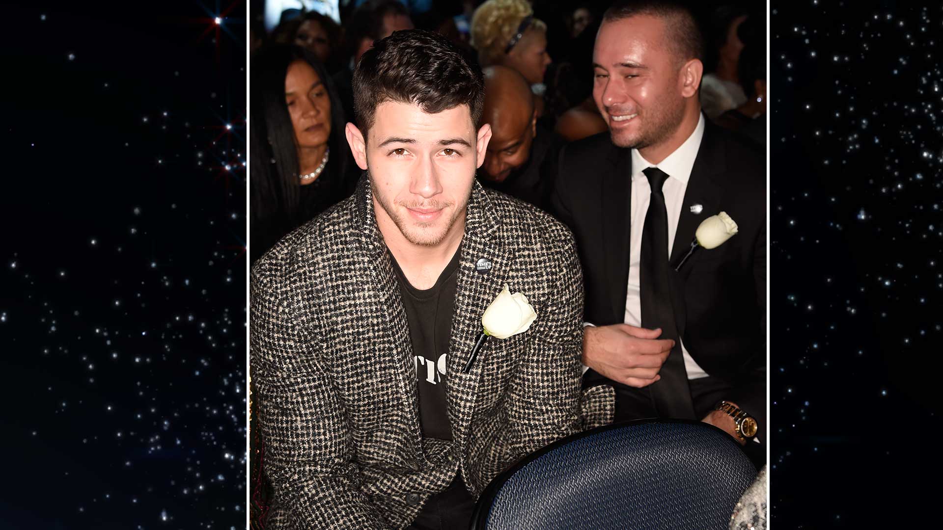 Nick Jonas, who presented at the 2018 GRAMMY Awards, offers a come-hither glance from his seat at Madison Square Garden.