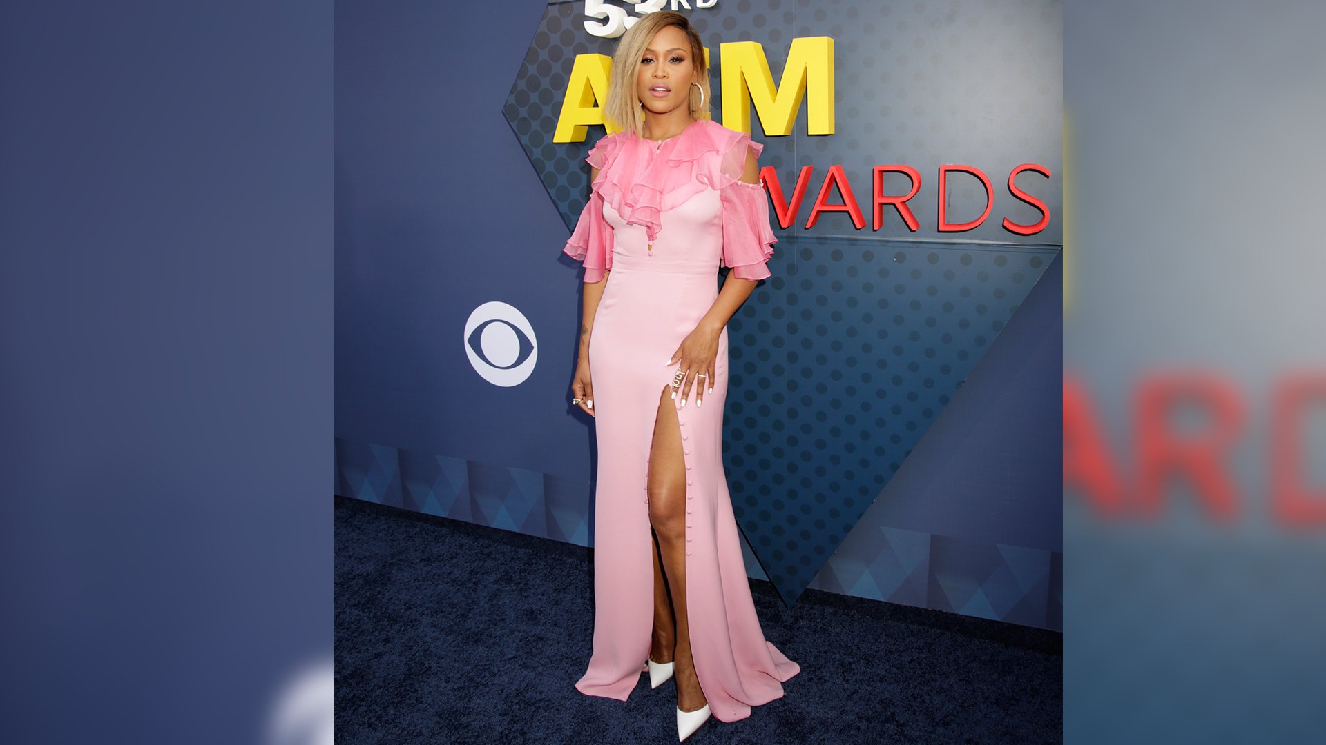 Eve might be a long way from The Talk, but she fits in famously on the ACM red carpet.