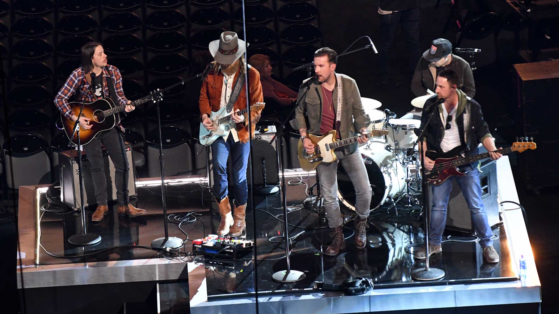 Brothers Osborne check their levels while rehearsing for the 52nd ACM Awards.