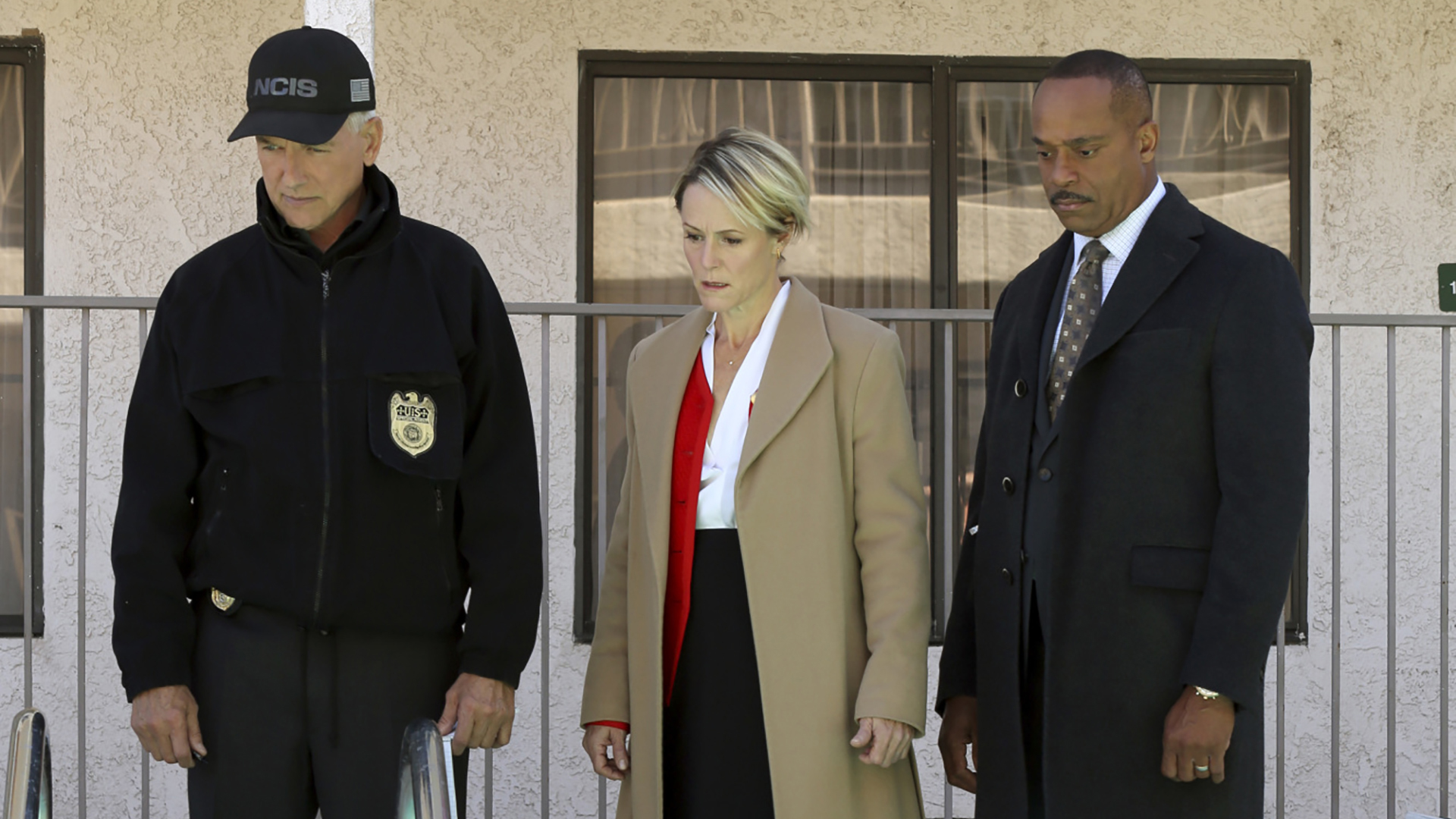 Gibbs, the Congresswoman, and Vance take in the crime scene.
