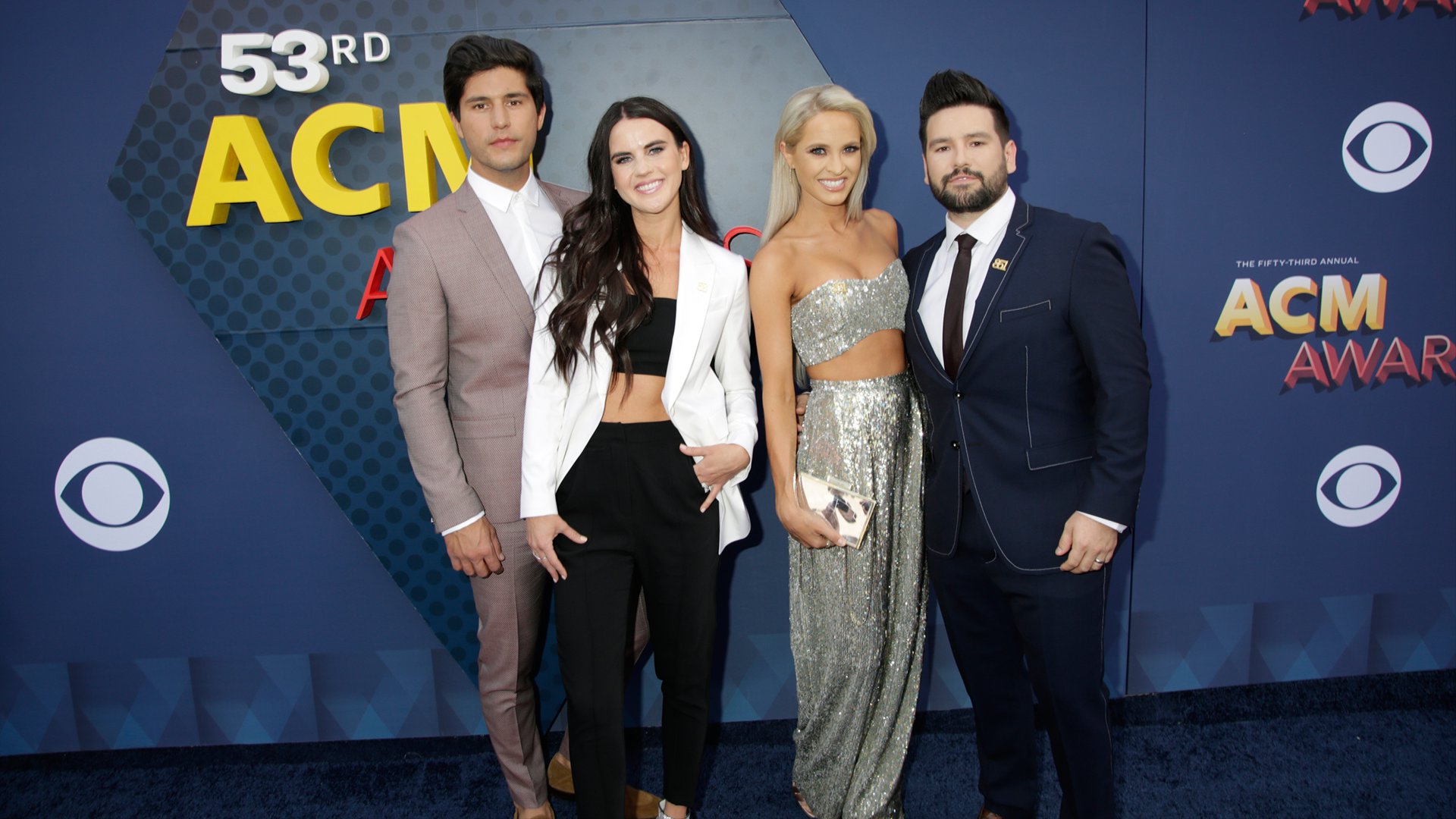 Dan + Shay pose with their beautiful dates before performing 