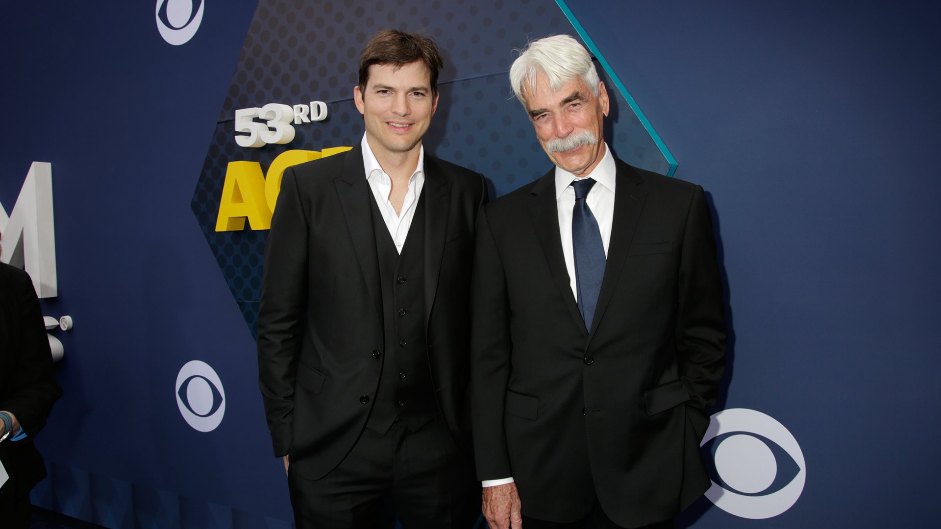 Ashton Kutcher and Sam Elliott, stars of The Ranch, take a break from filming to attend the 53rd ACM Awards.