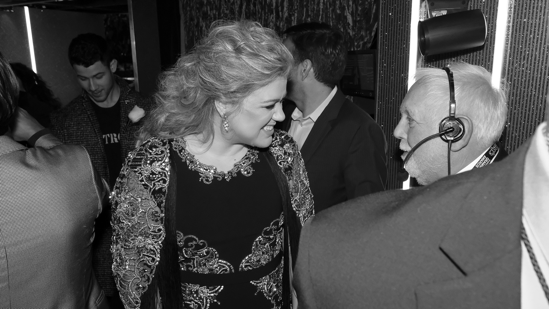Kelly Clarkson, nominated for Best Pop Solo Performance, gives an enormous smile backstage at the 60th Annual GRAMMY Awards.
