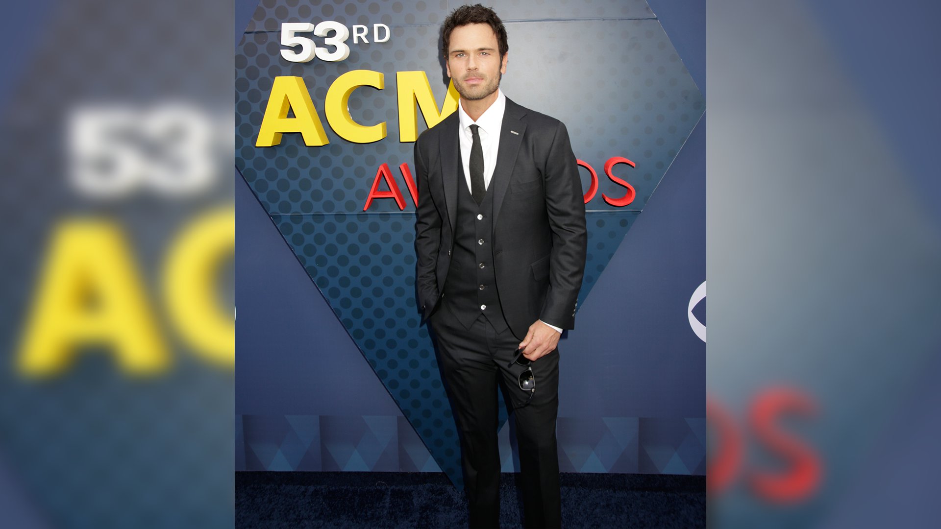 Singer Chuck Wicks looks wicked handsome in a three-piece suit.
