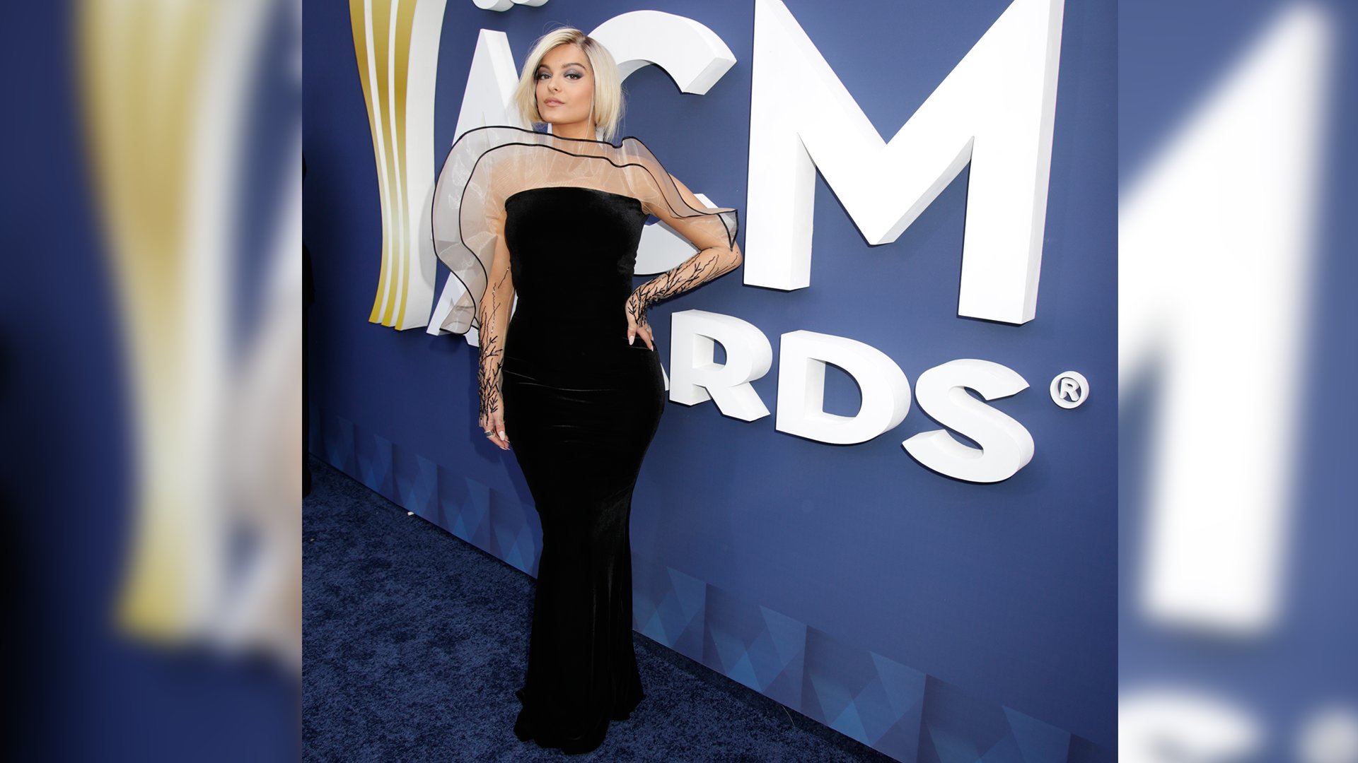 Pop singer Bebe Rexha knows how to make a statement while posing on the ACM red carpet.