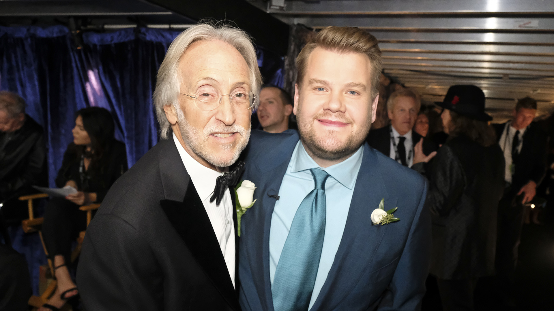 James Corden smiles for the camera with Recording Academy president Neil Portnow.