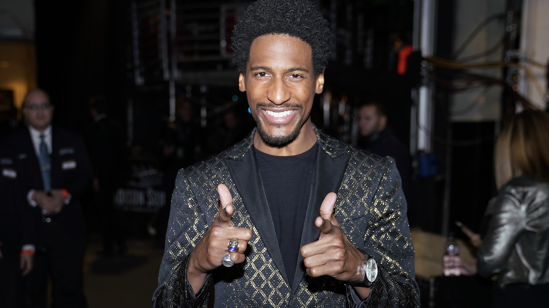 The Late Show with Stephen Colbert bandleader Jon Batiste flashes his pearly whites backstage.