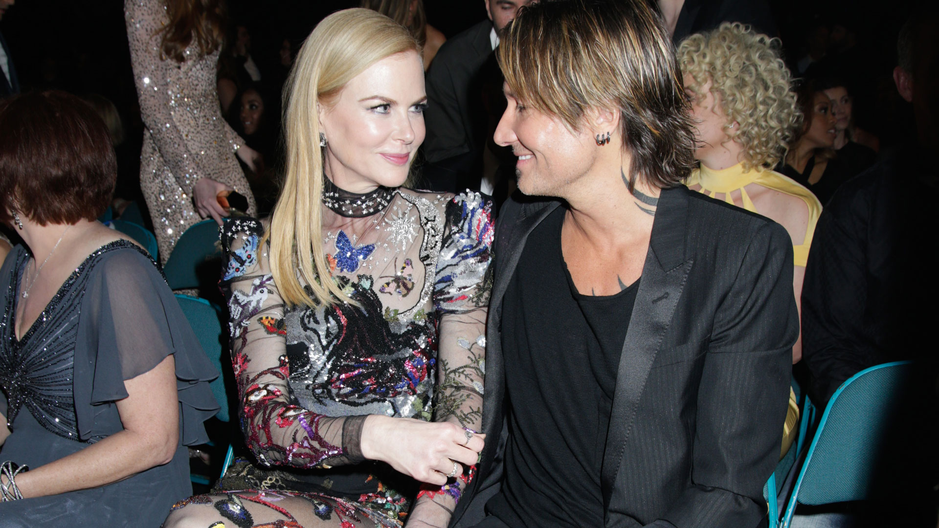 Actress Nicole Kidman exchanged loving glances with her husband, singer Keith Urban, before he took to the ACM stage to perform 