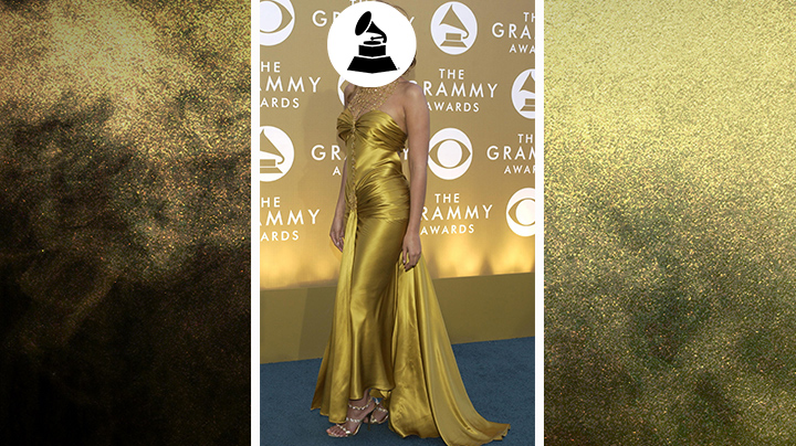 Who wore this golden gown with a high-drama neckline and glittering heels?