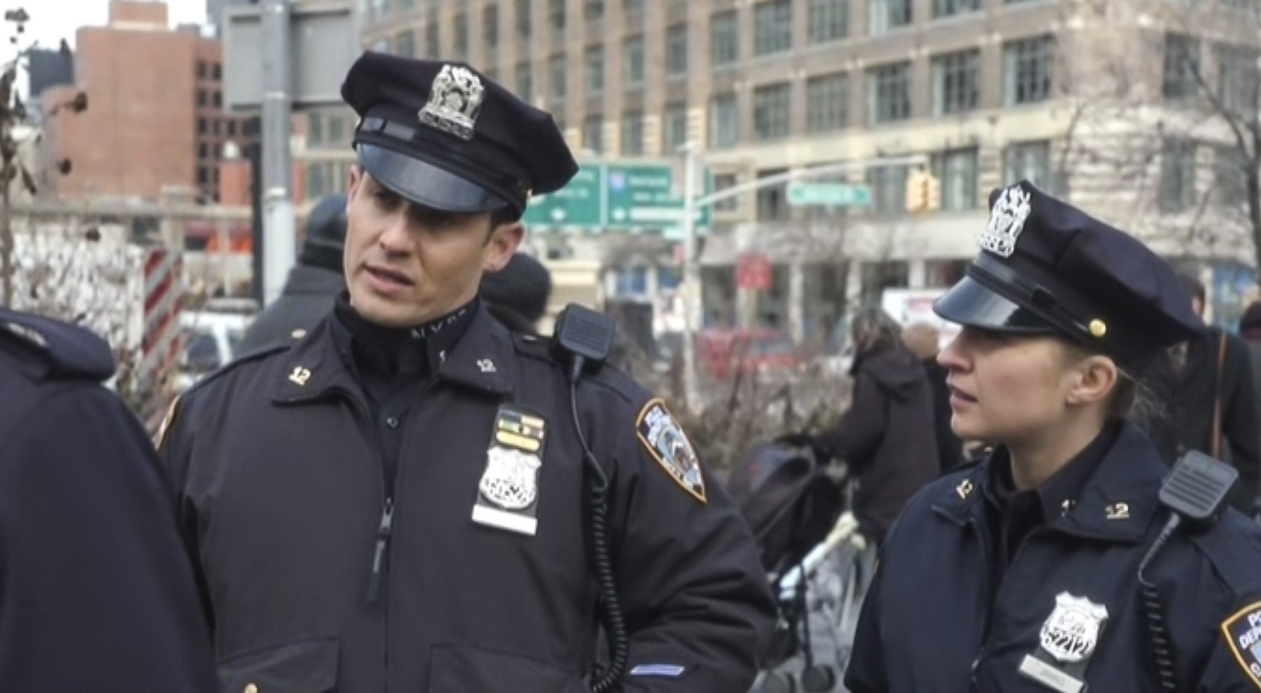 Will Estes as Officer Jamie Reagan and Vanessa Ray as Officer Edit Jenko
