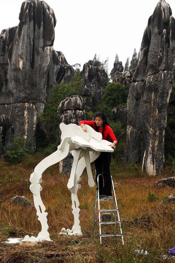 Christina Assembles a Dinosaur