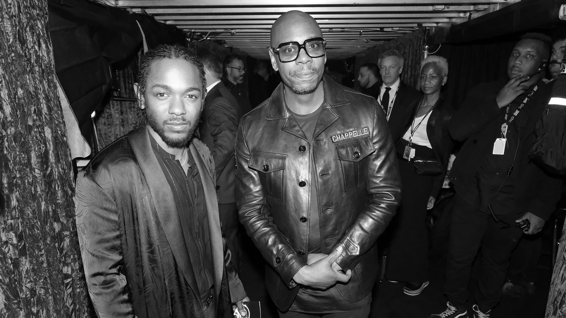 GRAMMY performer and Best Rap Album winner Kendrick Lamar poses with comedian Dave Chapelle.