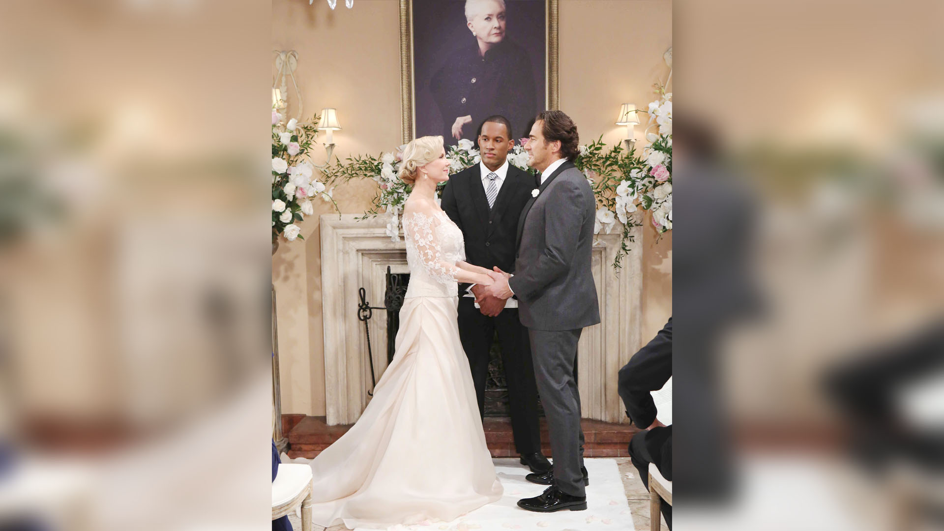 Surrounded by family and friends, and with a familiar face above the fireplace, Brooke and Ridge's wedding begins.