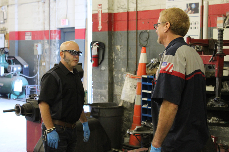 Learning about the job of a service manager is all new to Greg.