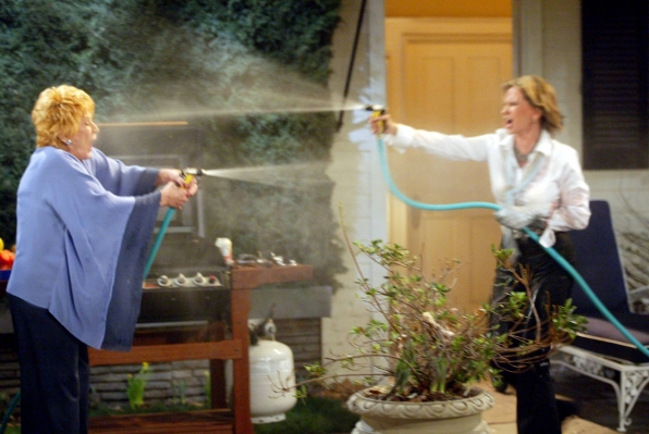 a still from Y&R with Katherine and Jill spraying water at each other
