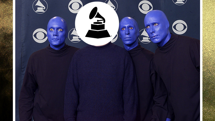 Who wore a mock turtleneck and posed with the Blue Man Group? 