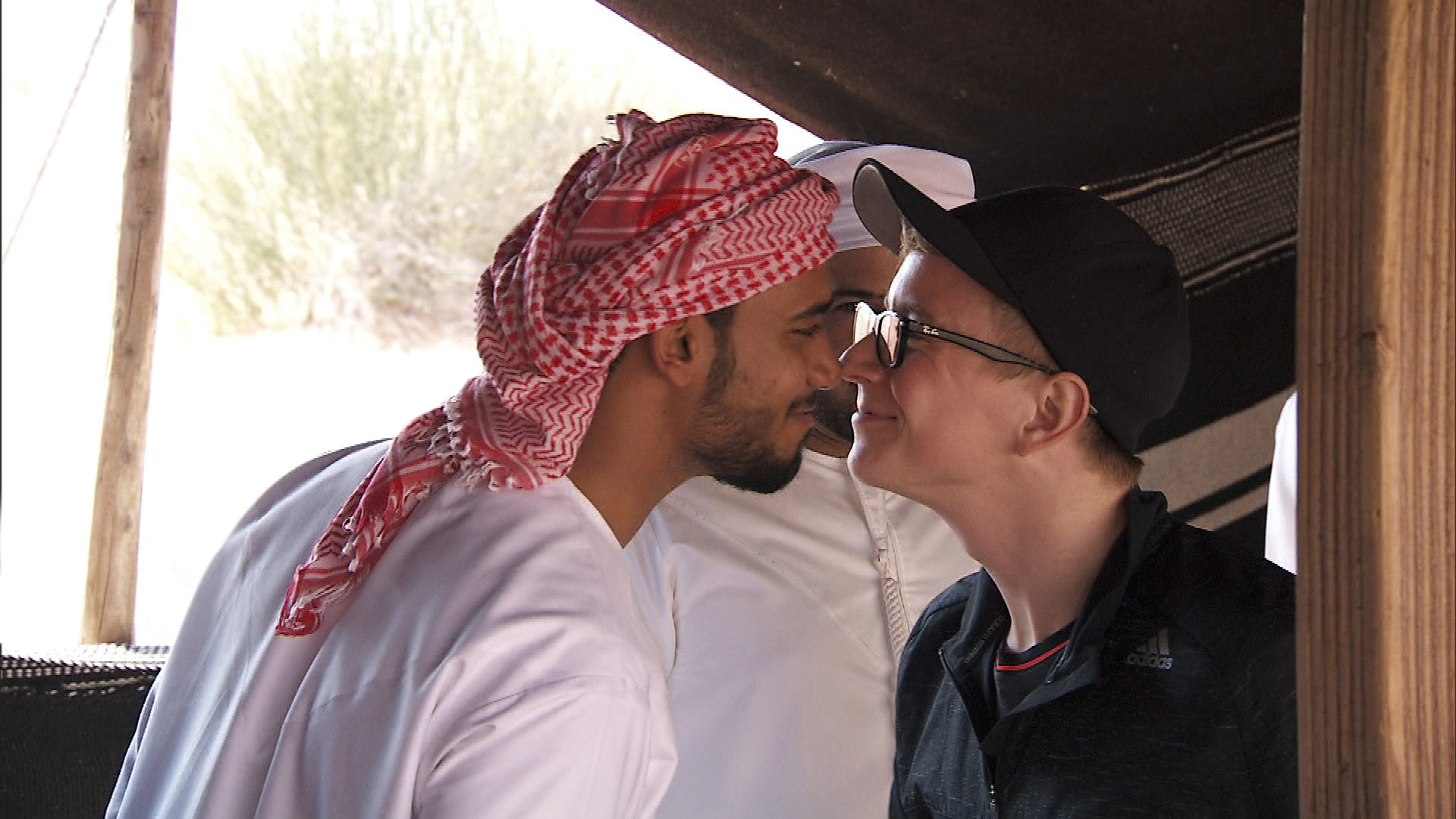 Tyler rubs noses with a local in Dubai.